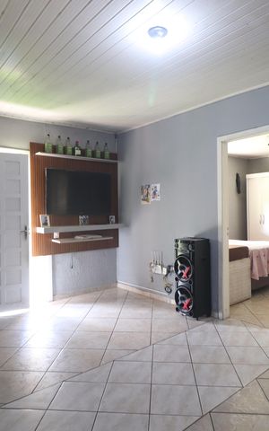 Casa à venda com 60m², 1 quarto e 2 vagasSala
