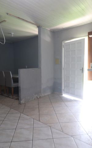 Casa à venda com 60m², 1 quarto e 2 vagasSala