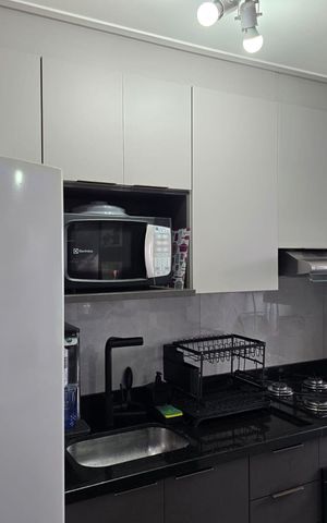 Apartamento à venda com 45m², 2 quartos e 1 vaga Apartamento à venda com 45m², 2 quartos e 1 vagaCozinha e Área de Serviço