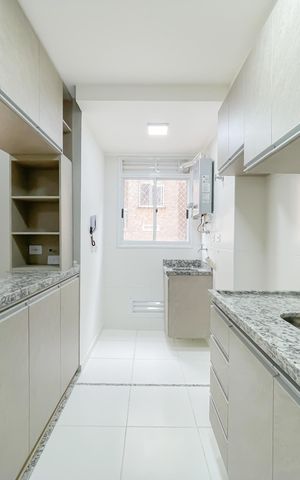 Apartamento à venda com 57m², 2 quartos e 2 vagas Apartamento à venda com 57m², 2 quartos e 2 vagasCozinha e Área de Serviço
