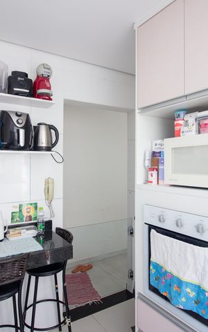 Apartamento à venda com 104m², 3 quartos e 1 vaga Apartamento à venda com 104m², 3 quartos e 1 vagaCozinha e Área de Serviço