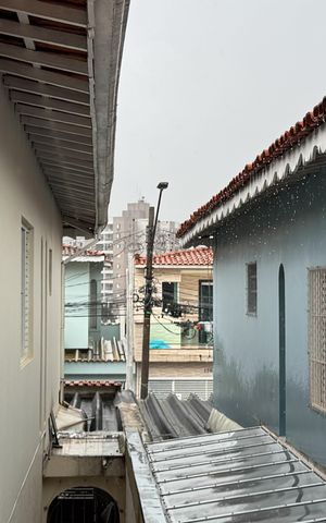 Casa à venda com 148m², 3 quartos e 2 vagas Casa à venda com 148m², 3 quartos e 2 vagasVista da Área - Churrasqueira