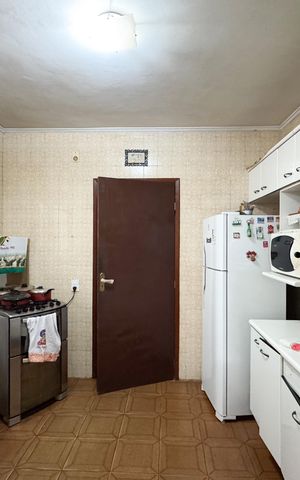Casa à venda com 148m², 3 quartos e 2 vagas Casa à venda com 148m², 3 quartos e 2 vagasCozinha