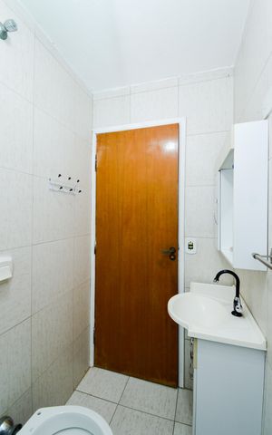 Casa à venda com 116m², 2 quartos e 3 vagasBanheiro da Suíte 1