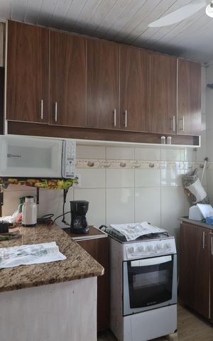 Casa à venda com 43m², 2 quartos e 2 vagasSala e Cozinha