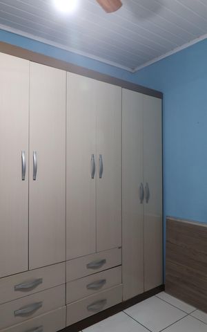 Casa à venda com 43m², 2 quartos e 2 vagasQuarto 1