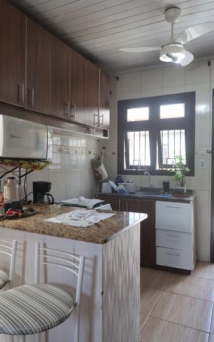 Casa à venda com 43m², 2 quartos e 2 vagasSala e Cozinha