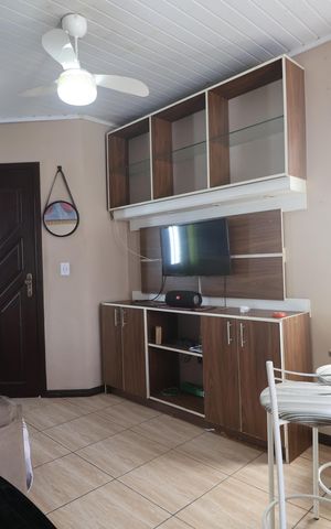 Casa à venda com 43m², 2 quartos e 2 vagasSala e Cozinha