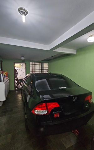 Casa à venda com 235m², 3 quartos e 4 vagas Casa à venda com 235m², 3 quartos e 4 vagasGaragem