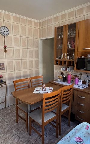Casa à venda com 68m², 2 quartos e 2 vagas Casa à venda com 68m², 2 quartos e 2 vagasCozinha