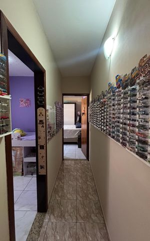 Casa à venda com 68m², 2 quartos e 2 vagas Casa à venda com 68m², 2 quartos e 2 vagasCorredor