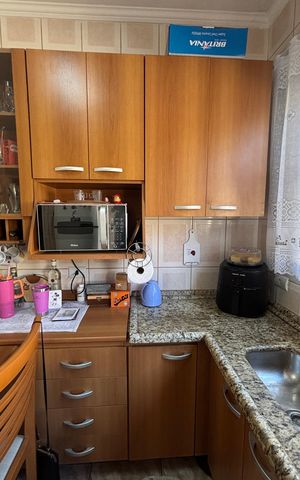 Casa à venda com 68m², 2 quartos e 2 vagas Casa à venda com 68m², 2 quartos e 2 vagasCozinha