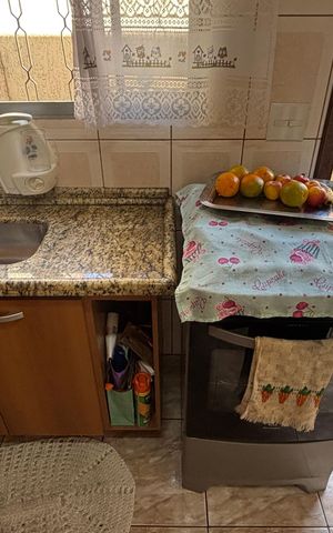 Casa à venda com 68m², 2 quartos e 2 vagas Casa à venda com 68m², 2 quartos e 2 vagasCozinha