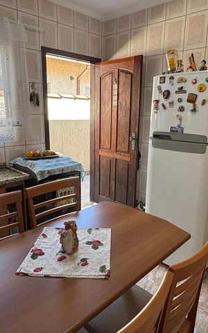 Casa à venda com 68m², 2 quartos e 2 vagas Casa à venda com 68m², 2 quartos e 2 vagasCozinha
