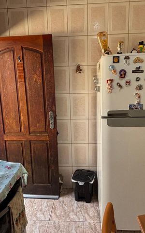 Casa à venda com 68m², 2 quartos e 2 vagas Casa à venda com 68m², 2 quartos e 2 vagasCozinha