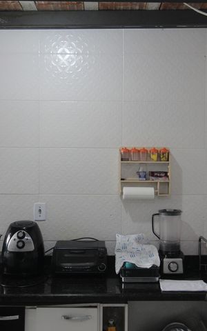 Casa de condomínio à venda com 96m², 2 quartos e sem vagaCozinha e Área de Serviço