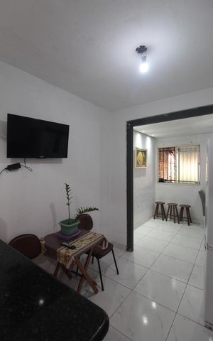 Casa de condomínio à venda com 96m², 2 quartos e sem vagaCozinha e Área de Serviço