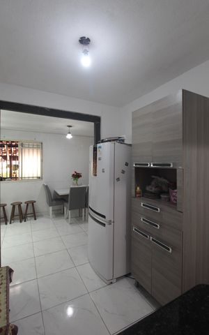 Casa de condomínio à venda com 96m², 2 quartos e sem vagaCozinha e Área de Serviço