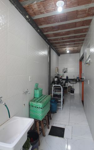 Casa de condomínio à venda com 96m², 2 quartos e sem vagaCozinha e Área de Serviço