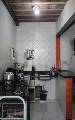 Casa de condomínio à venda com 96m², 2 quartos e sem vagaCozinha e Área de Serviço