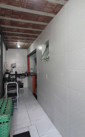 Casa de condomínio à venda com 96m², 2 quartos e sem vagaCozinha e Área de Serviço