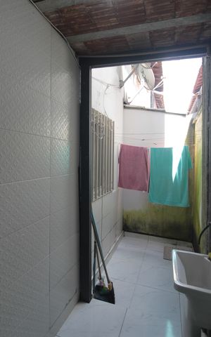Casa de condomínio à venda com 96m², 2 quartos e sem vagaCozinha e Área de Serviço