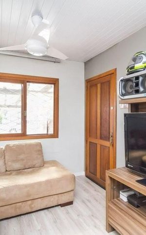 Casa à venda com 54m², 2 quartos e 2 vagas Casa à venda com 54m², 2 quartos e 2 vagasSala