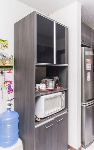 Casa à venda com 54m², 2 quartos e 2 vagas Casa à venda com 54m², 2 quartos e 2 vagasCozinha