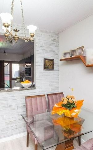 Casa à venda com 54m², 2 quartos e 2 vagas Casa à venda com 54m², 2 quartos e 2 vagasSala