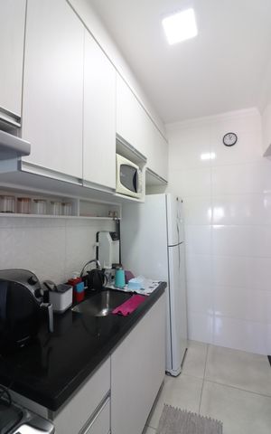Apartamento à venda com 59m², 2 quartos e 1 vagaCozinha e Área de Serviço