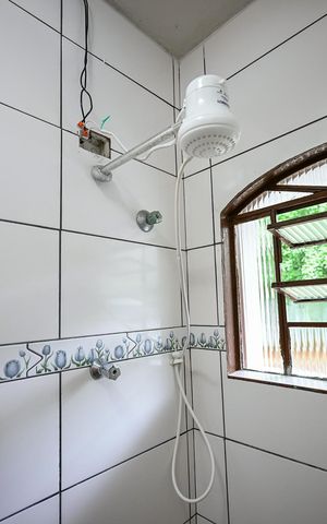 Casa à venda com 480m², 7 quartos e 21 vagasChuveiro do Banheiro 1 da Casa 1