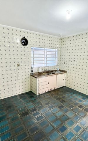 Casa à venda com 137m², 2 quartos e 2 vagas Casa à venda com 137m², 2 quartos e 2 vagasCozinha