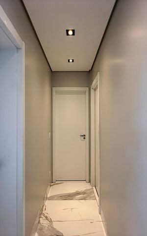 Apartamento à venda com 106m², 3 quartos e 2 vagas Apartamento à venda com 106m², 3 quartos e 2 vagasCorredor Quartos