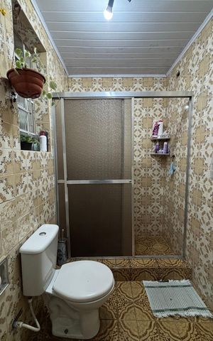 Casa à venda com 320m², 3 quartos e 2 vagas Casa à venda com 320m², 3 quartos e 2 vagasBanheiro da Suíte