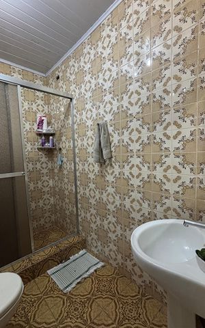 Casa à venda com 320m², 3 quartos e 2 vagas Casa à venda com 320m², 3 quartos e 2 vagasBanheiro da Suíte
