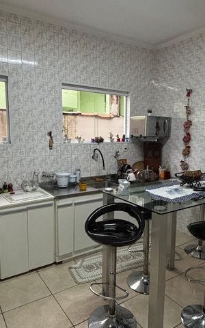 Casa à venda com 320m², 3 quartos e 2 vagas Casa à venda com 320m², 3 quartos e 2 vagasCozinha