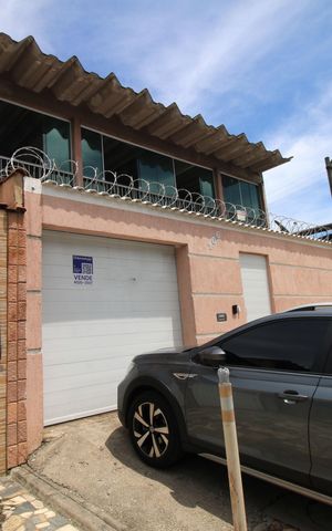 Casa à venda com 240m², 4 quartos e 3 vagasFachada da casa