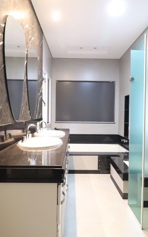 Casa de condomínio para alugar com 250m², 4 quartos e 4 vagasBanheiro do Quarto 4