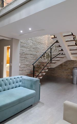 Casa de condomínio para alugar com 250m², 4 quartos e 4 vagasSala