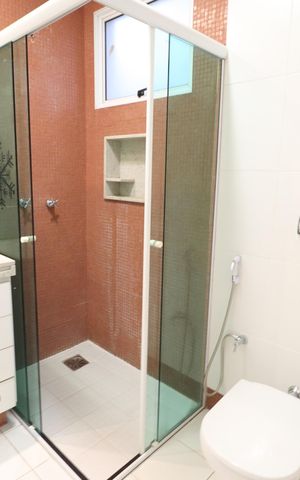 Casa de condomínio para alugar com 250m², 4 quartos e 4 vagasBanheiro do Quarto 3