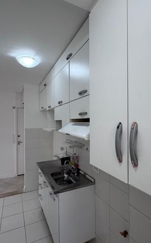 Apartamento à venda com 53m², 3 quartos e 1 vaga Apartamento à venda com 53m², 3 quartos e 1 vagaCozinha e Área de Serviço