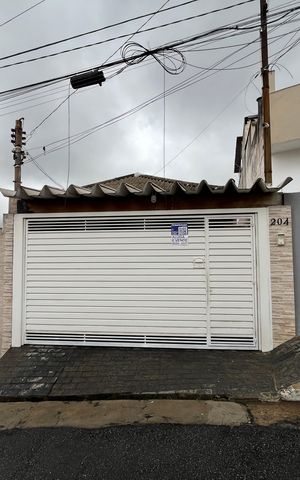Casa à venda com 98m², 2 quartos e 2 vagasFachada/Placa