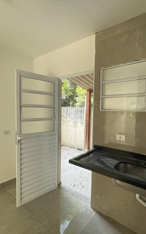 Casa de condomínio para alugar com 61m², 2 quartos e 2 vagasCozinha