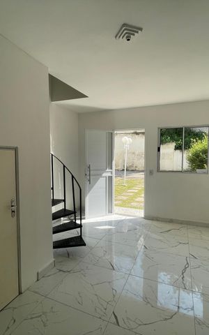 Casa de condomínio para alugar com 61m², 2 quartos e 2 vagasSala