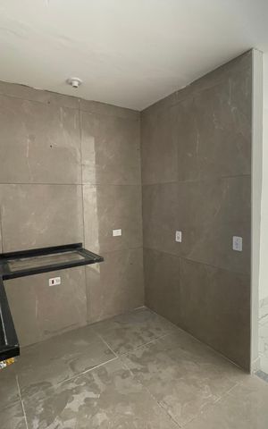 Casa de condomínio para alugar com 61m², 2 quartos e 2 vagasCozinha 