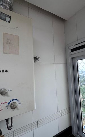 Apartamento à venda com 141m², 3 quartos e 2 vagas Apartamento à venda com 141m², 3 quartos e 2 vagasCozinha e Área de Serviço