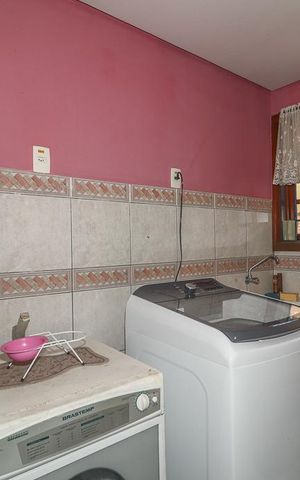 Casa de condomínio à venda com 306m², 5 quartos e 4 vagasLavanderia