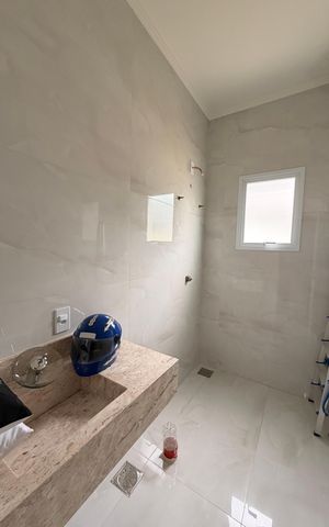 Casa de condomínio à venda com 450m², 4 quartos e 4 vagasBanheiro da Suíte 3