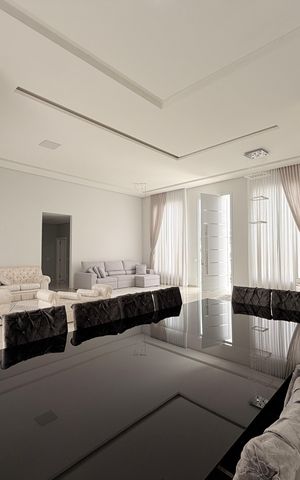 Casa de condomínio à venda com 450m², 4 quartos e 4 vagasSala