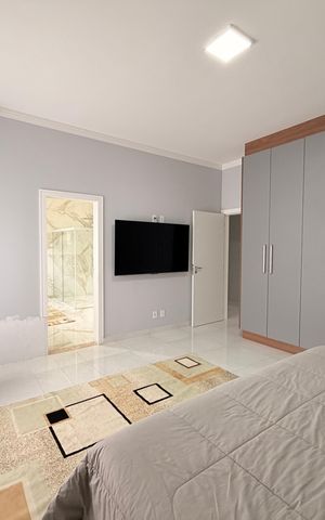 Casa de condomínio à venda com 450m², 4 quartos e 4 vagasSuíte 1